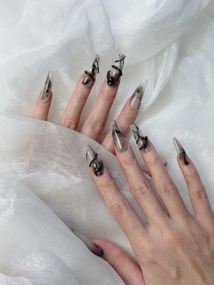Model Wearing Inked Serpent Press-On Nails – Bold Fashion Statement