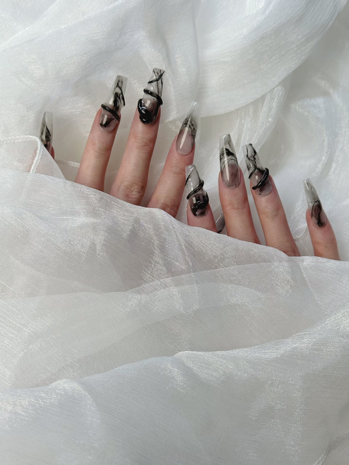 Close-up of Inked Serpent Press-On Nails – Bold and Unique Snake Print Design