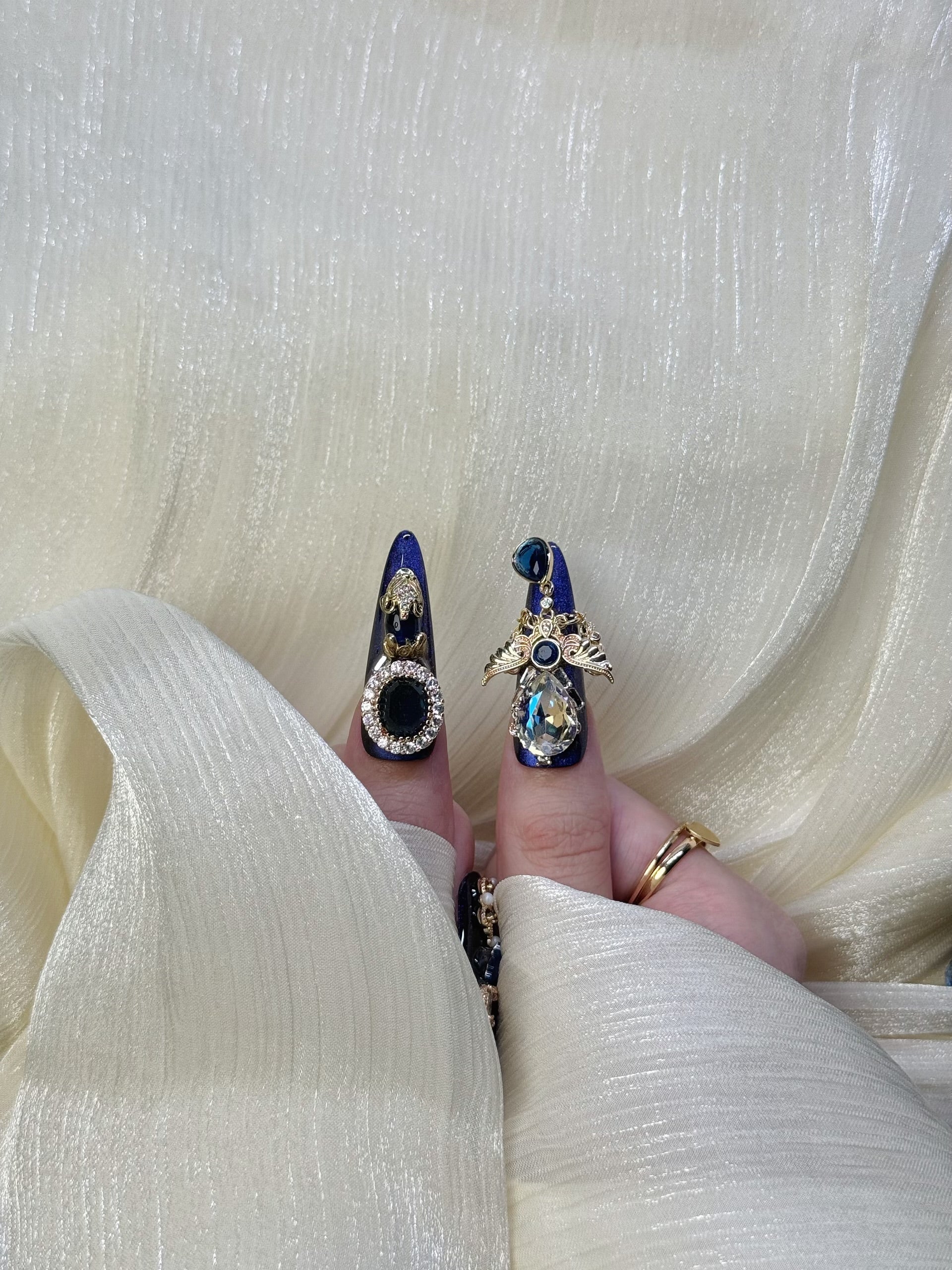Close-up of Little Sapphire Press-On Nails – Deep Sapphire Blue Nail Art