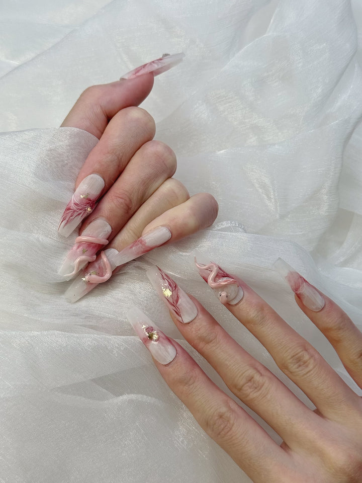 Model Wearing Lunar Serpent Press-On Nails – Perfect for Halloween and Mystical Events