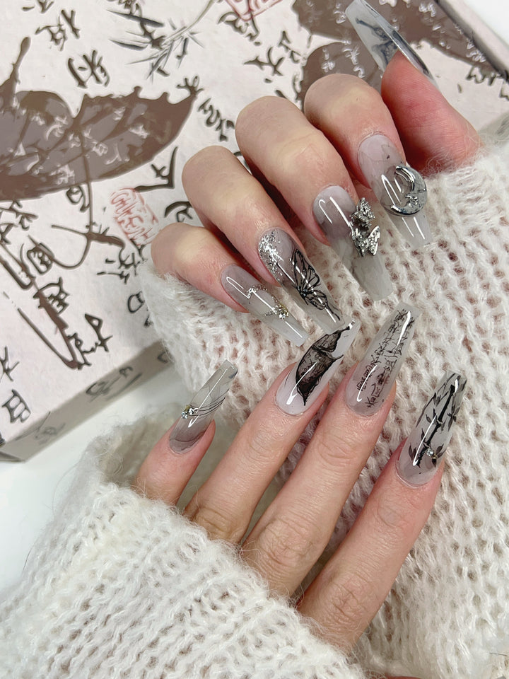 Close-up of Inked Moon Press-On Nails – High-Quality Celestial Design