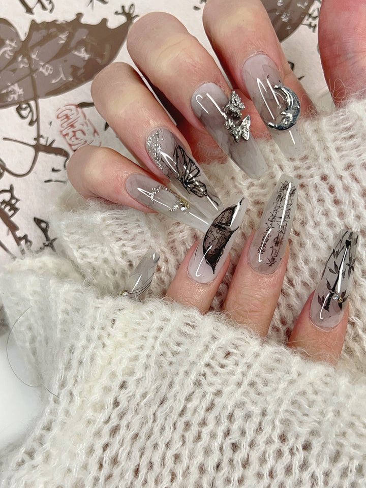 Close-up of Inked Moon Press-On Nails – High-Quality Celestial Design