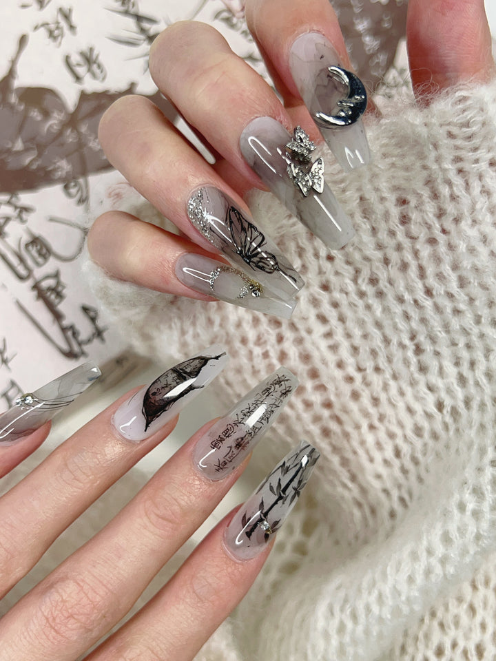 Close-up of Inked Moon Press-On Nails – High-Quality Celestial Design