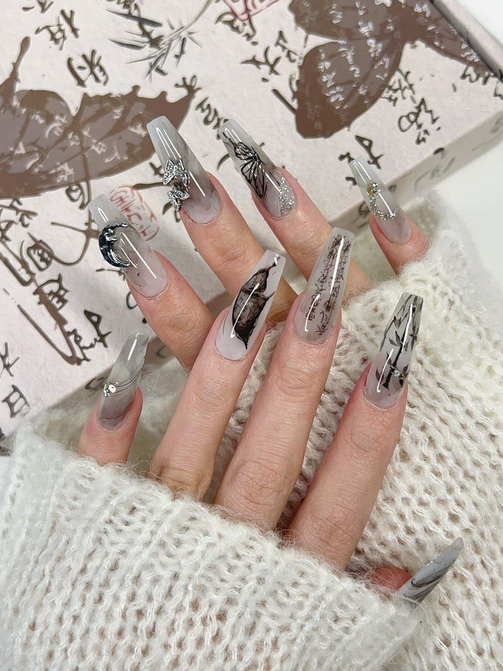 Close-up of Inked Moon Press-On Nails – High-Quality Celestial Design