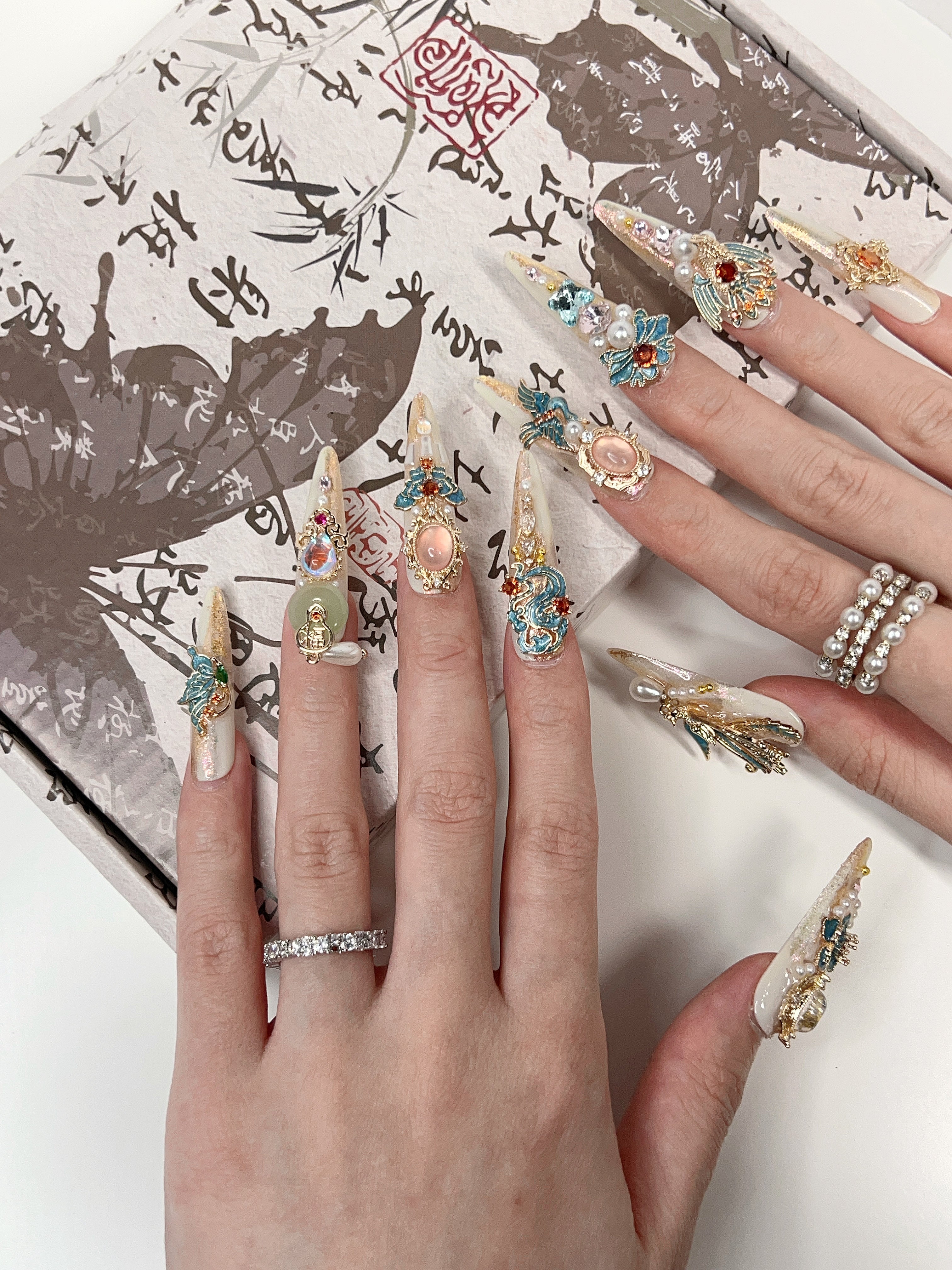 Model Wearing Phoenix Nirvana Press-On Nails – Perfect for Glamorous Events