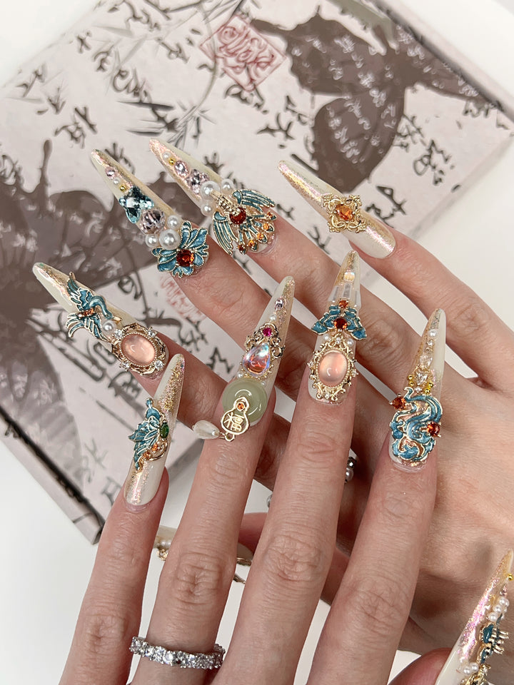 Model Wearing Phoenix Nirvana Press-On Nails – Perfect for Glamorous Events