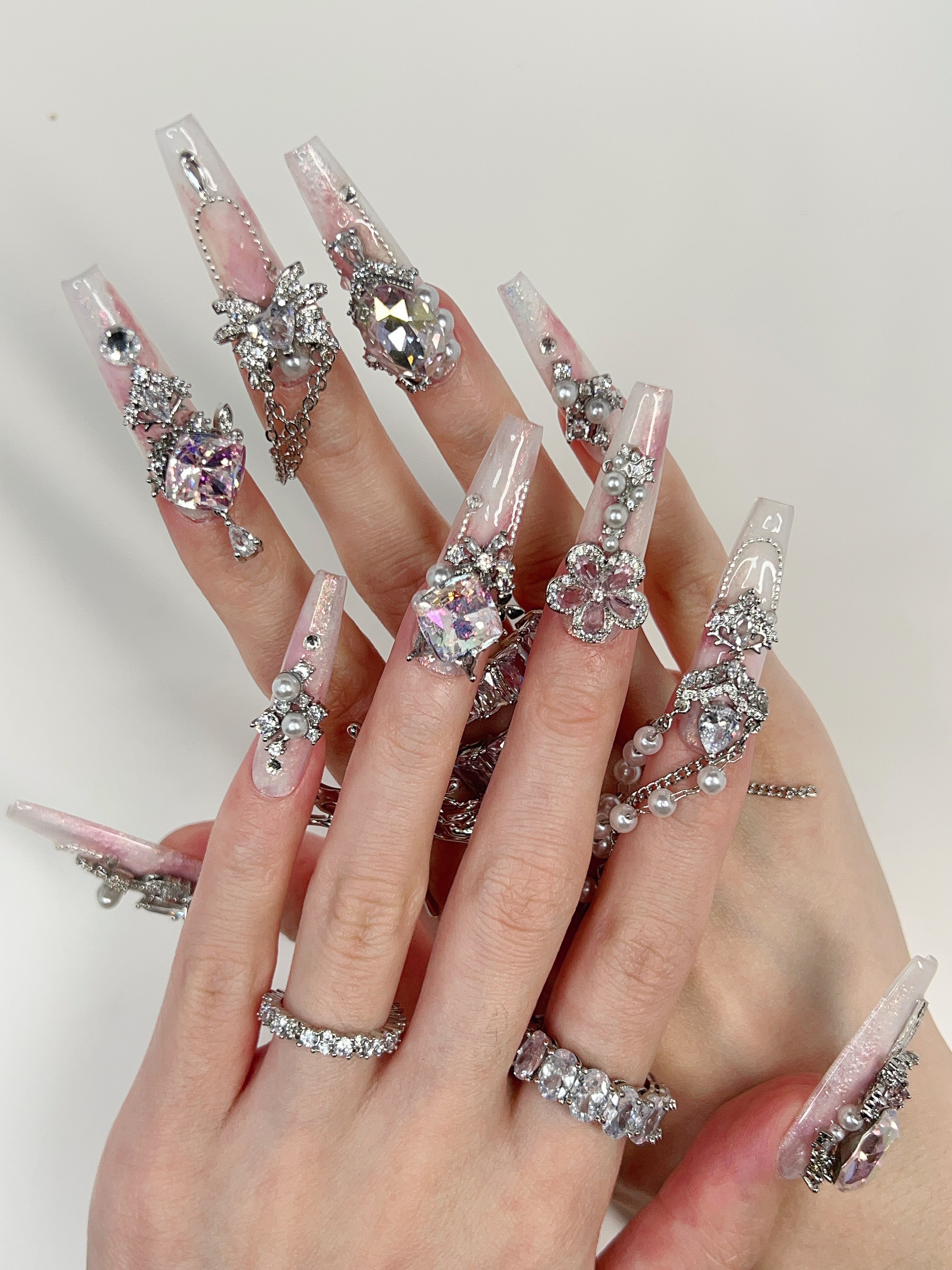 Model Wearing Pink Aurora Press-On Nails – Perfect for Romantic Events