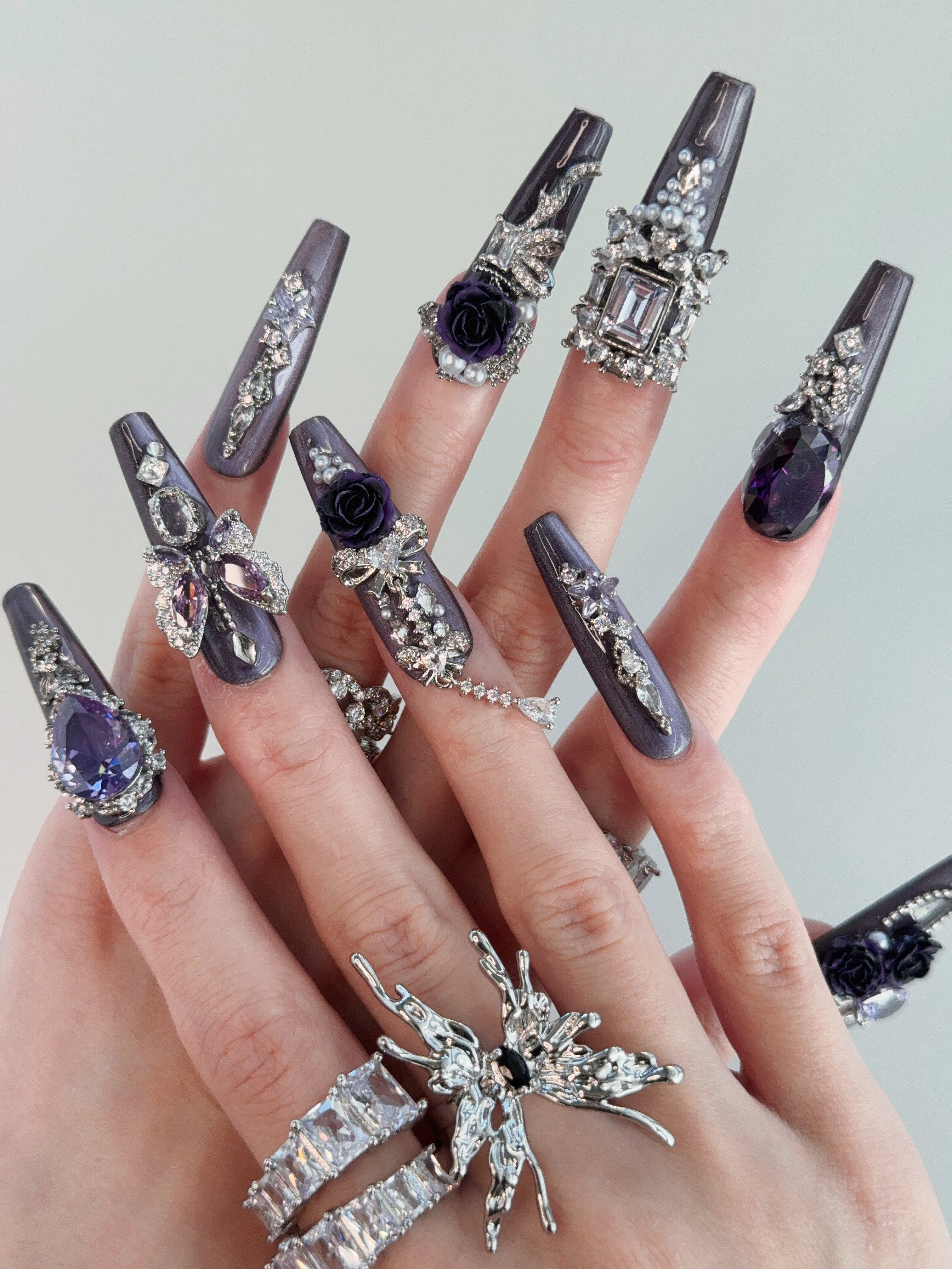 Model Wearing Purple Reign Press-On Nails – Perfect for Evening Events