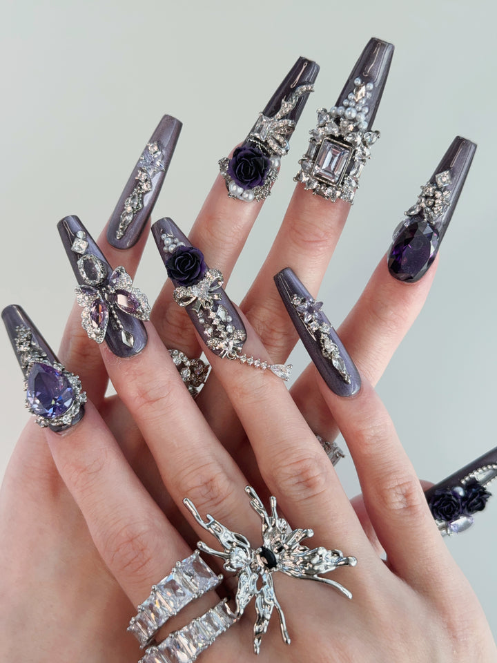 Model Wearing Purple Reign Press-On Nails – Perfect for Evening Events