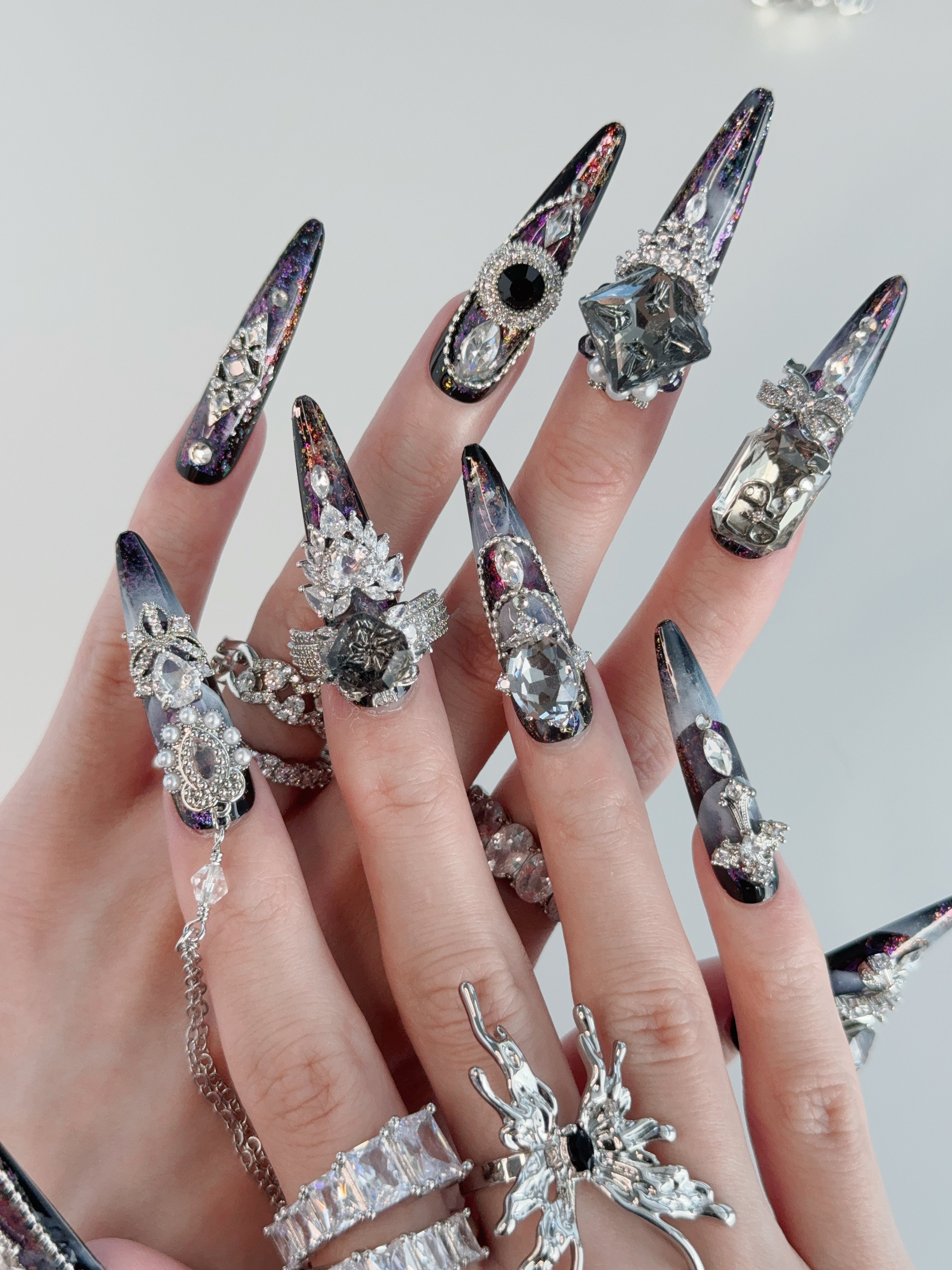 Model Wearing Starlit Noir Press-On Nails – Perfect for Evening Events