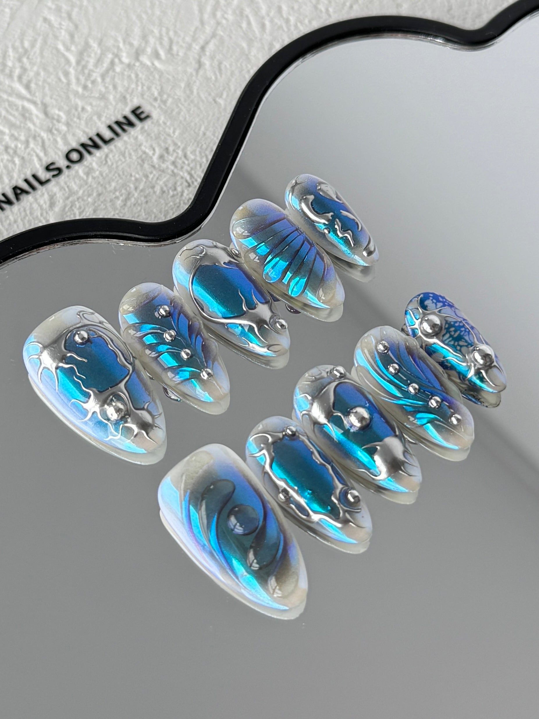 Bold ocean-inspired nails by FairyNails
