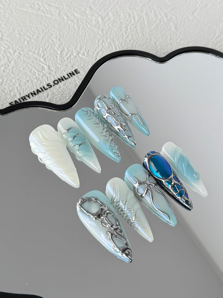 Reflective space-inspired nails by FairyNails