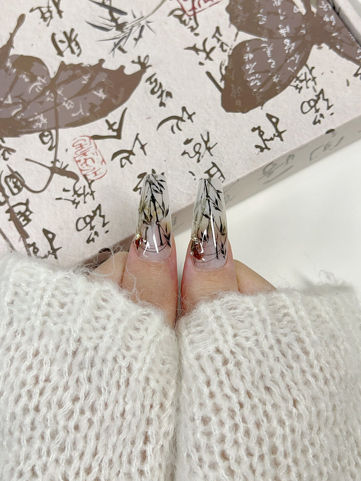 Model Wearing Ink Whisper Press-On Nails – Perfect for Creative Events