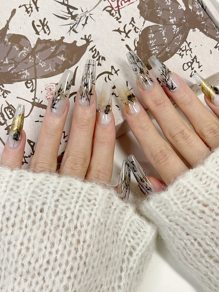 Model Wearing Ink Whisper Press-On Nails – Perfect for Creative Events