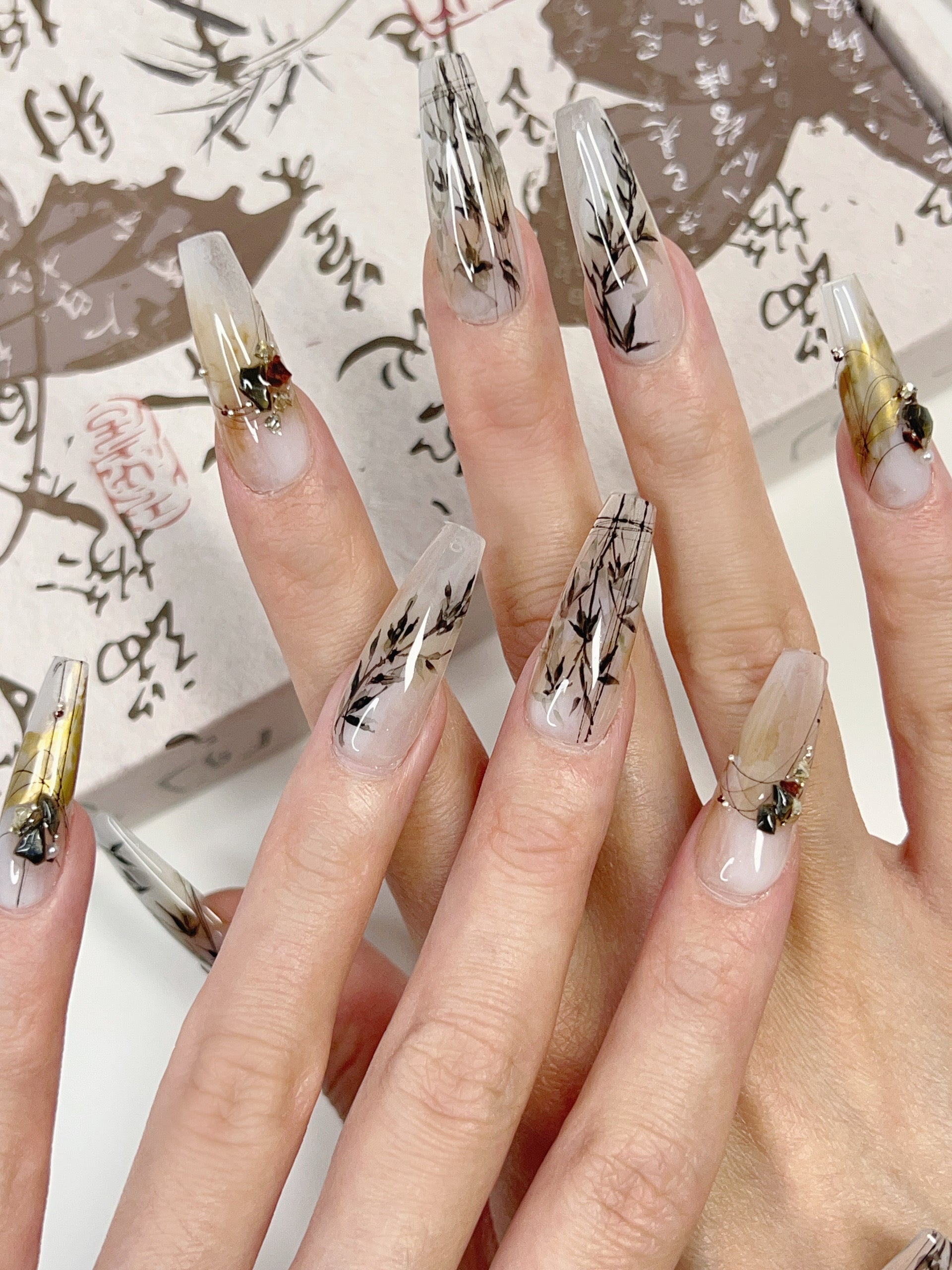 Model Wearing Ink Whisper Press-On Nails – Perfect for Creative Events