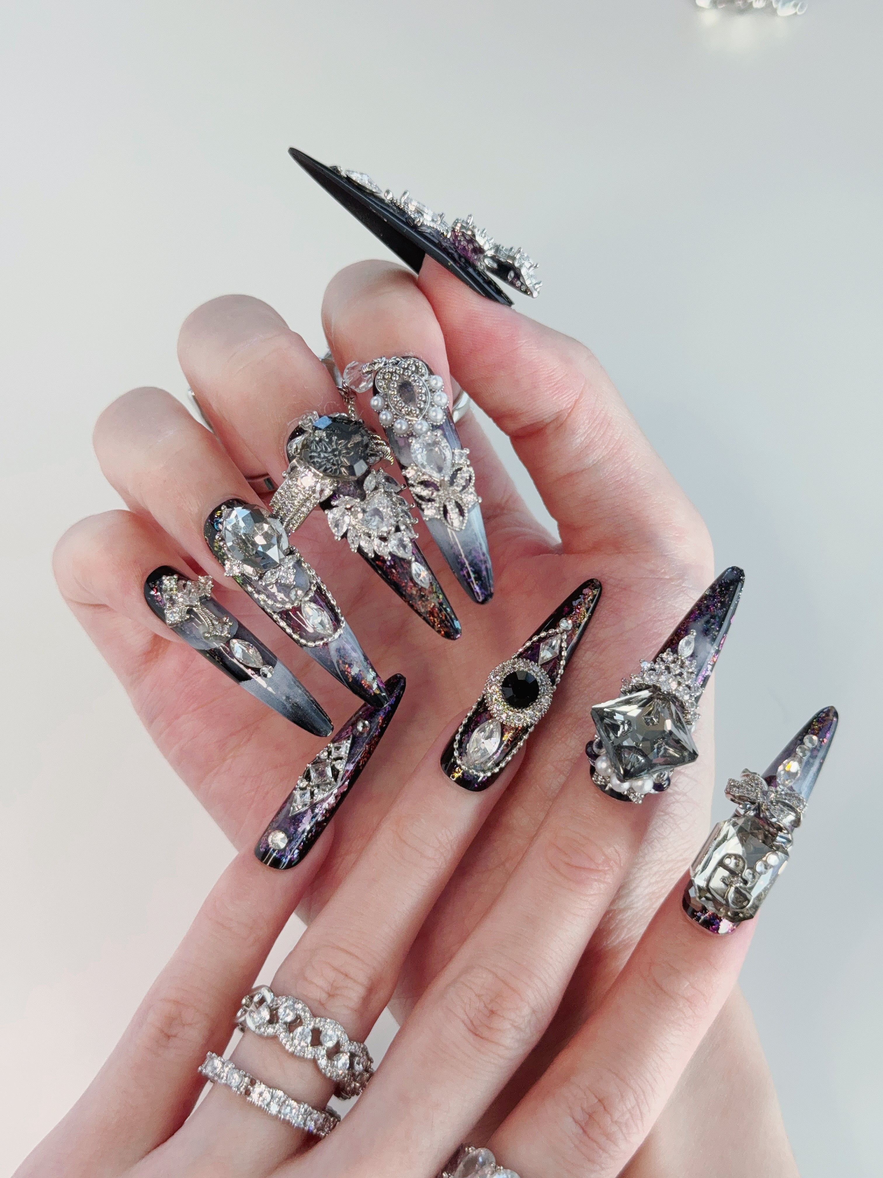 Model Wearing Starlit Noir Press-On Nails – Perfect for Evening Events
